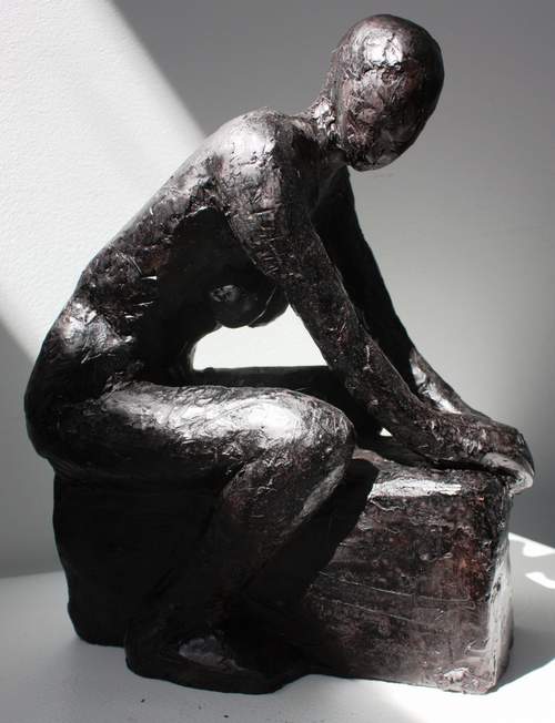 Kvinde sidende overskrævs