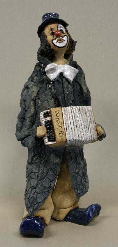 Stående klovn med hamonika