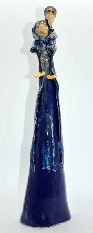 Fugl med barn på søjle