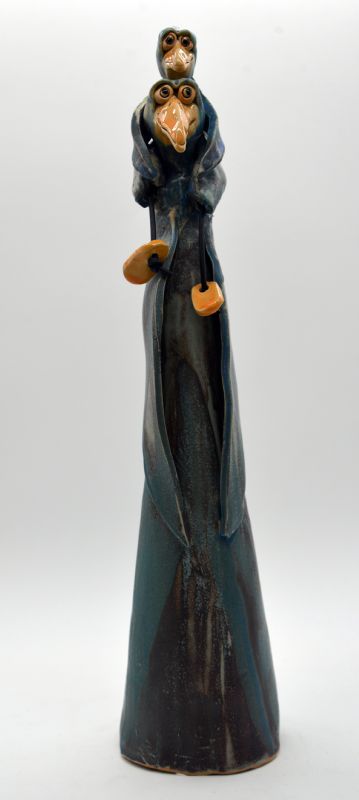 Fugl med barn på søjle