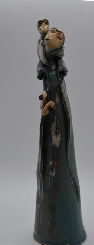 Fugl med barn på søjle