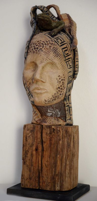 Herrehoved med øgle