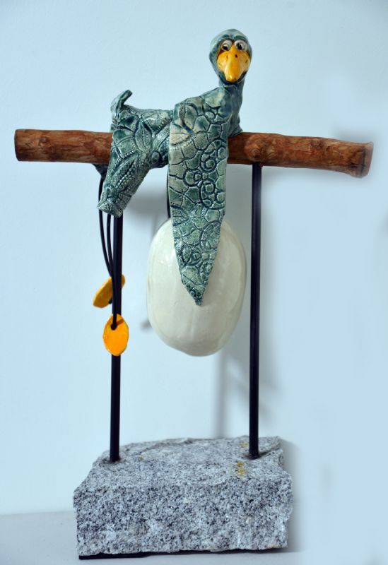 Hængende fugl med æg - i stativ 