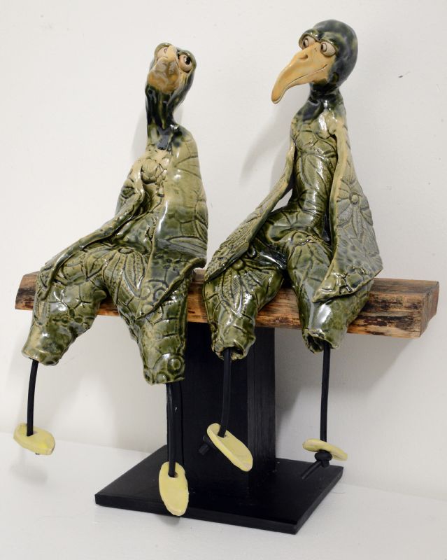 2 store fugle på bænk