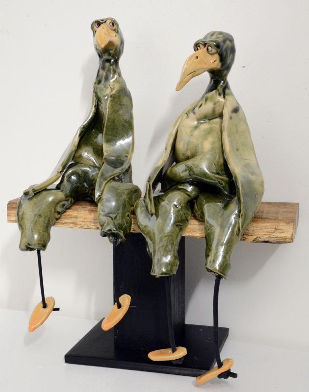 2 store fugle på bænk