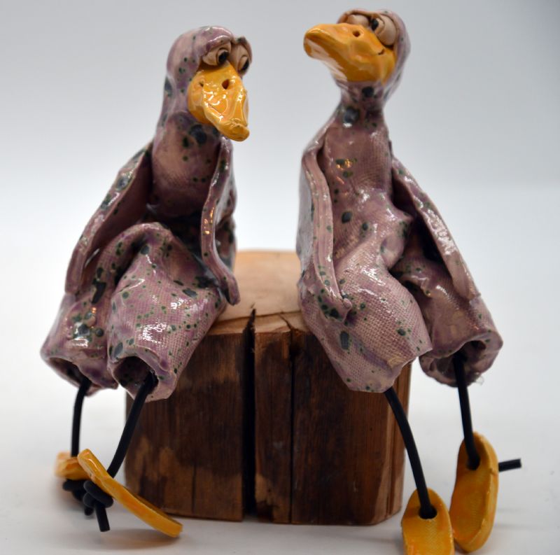 To fugle på træstub