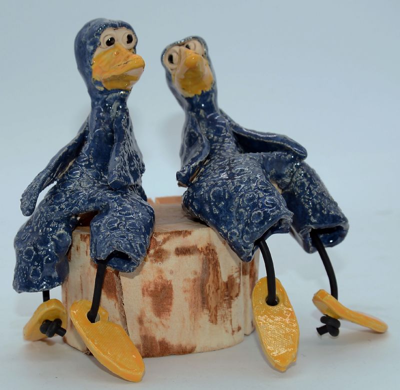 To fugle på træstub