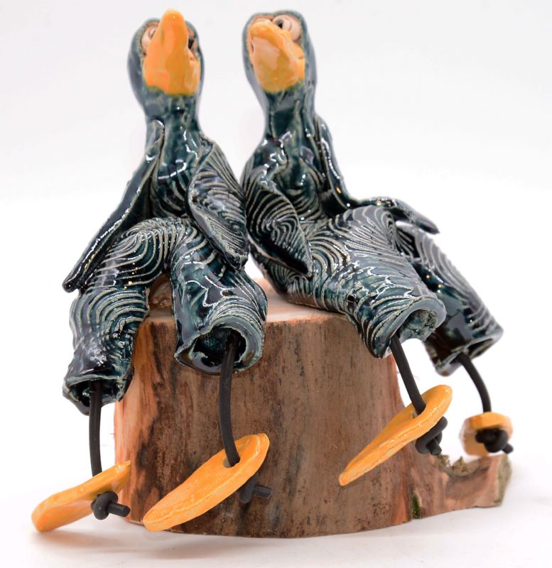 To fugle på træstub