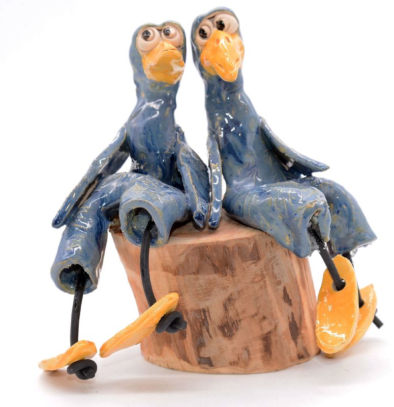 To fugle på træstub