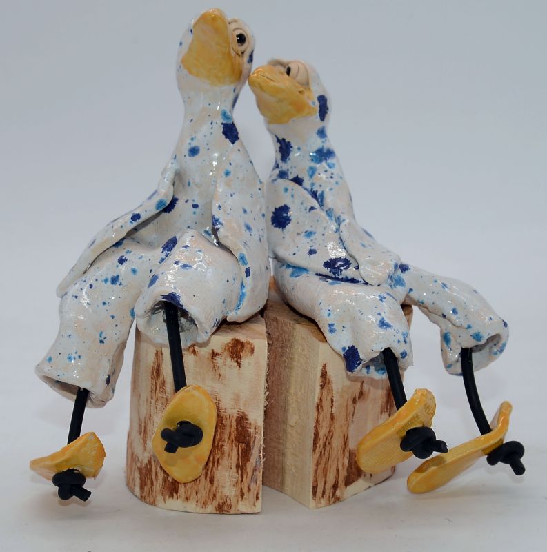 To fugle på træstub