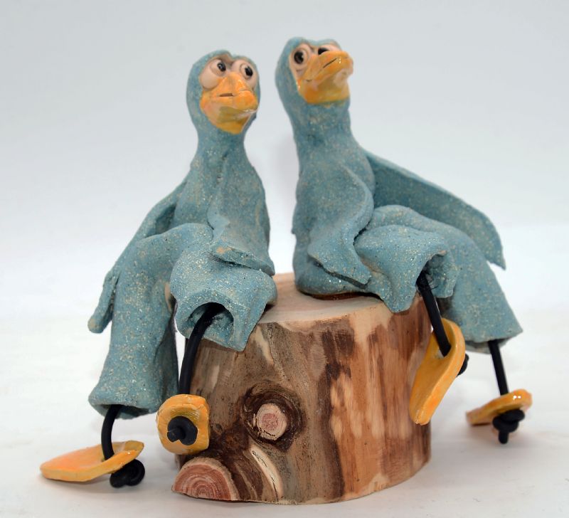 To fugle på træstub