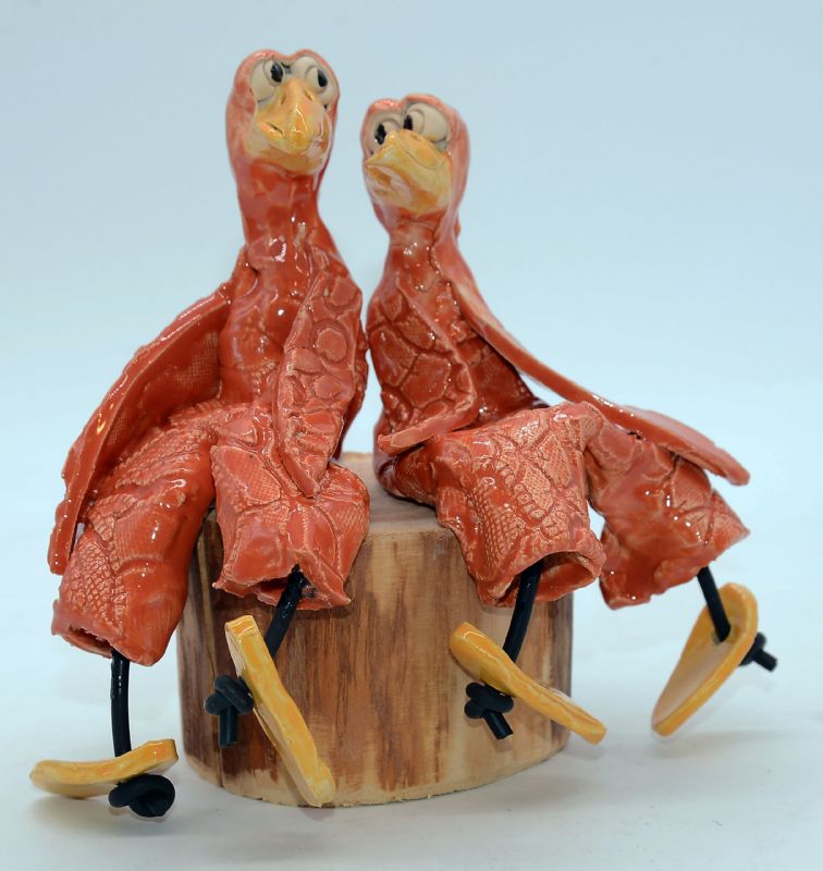 To fugle på træstub