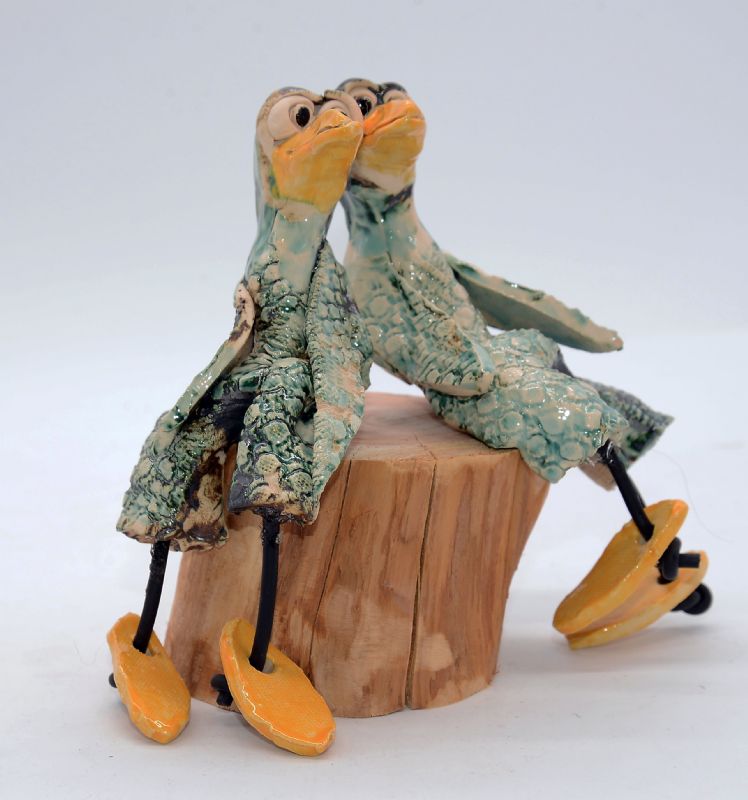 To fugle på træstub