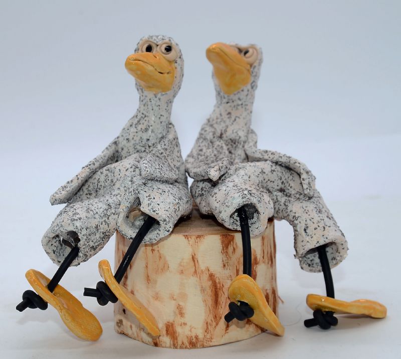 To fugle på træstub