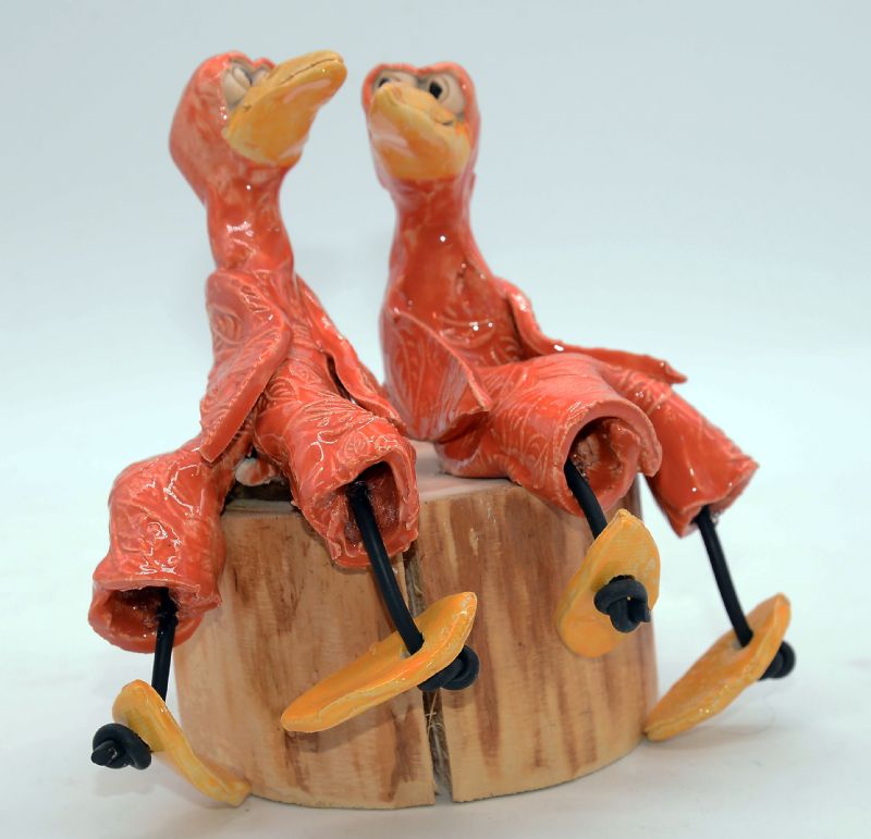 To fugle på træstub