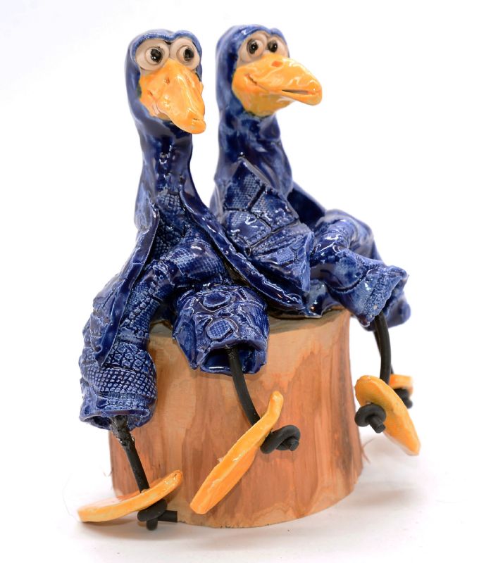 To fugle på træstub