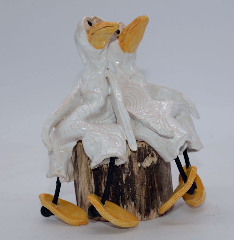 To fugle på træstub