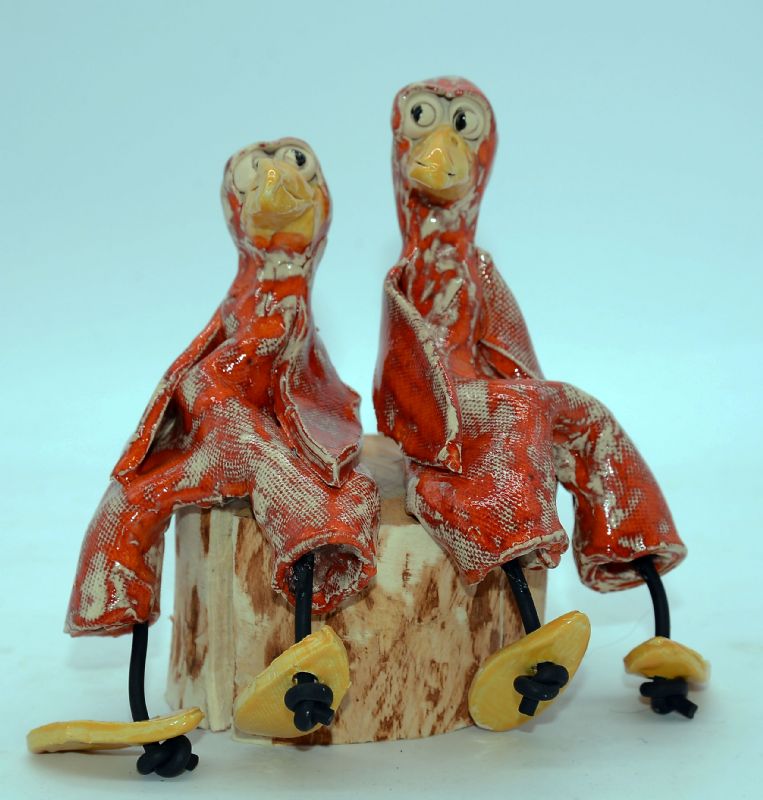 To fugle på træstub