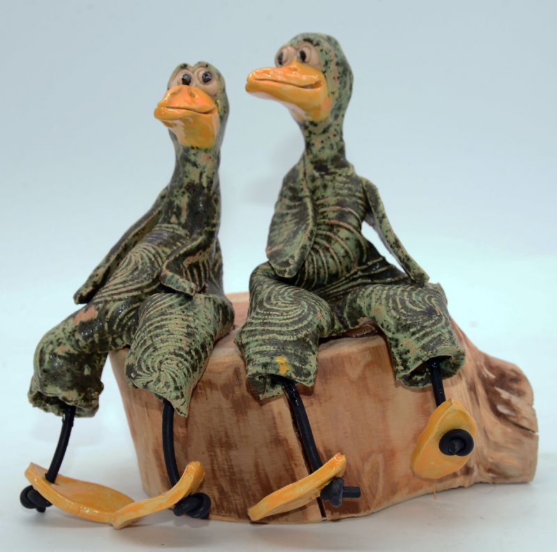 To fugle på træstub