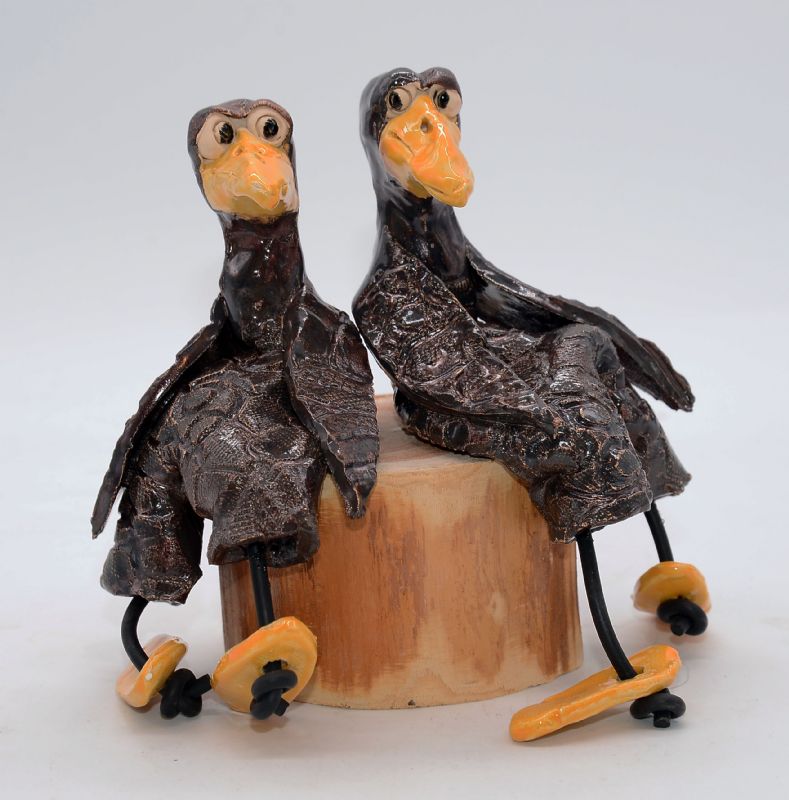 To fugle på træstub