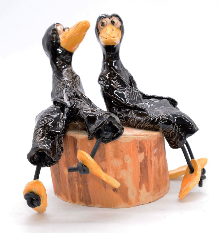 To fugle på træstub