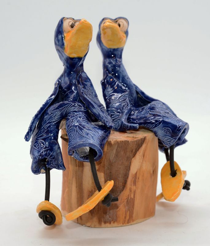 To fugle på træstub