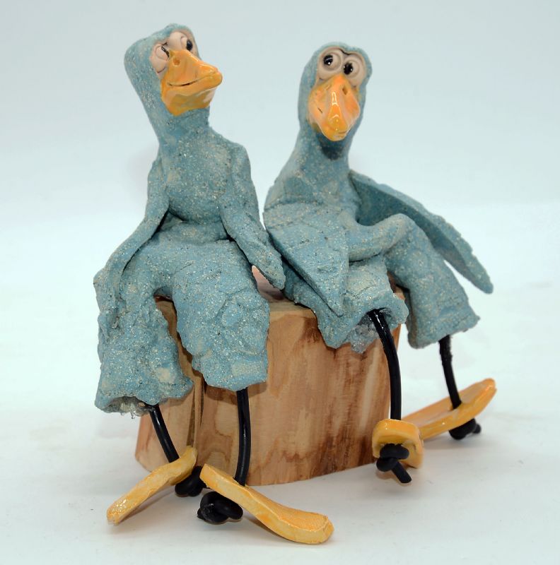 To fugle på træstub