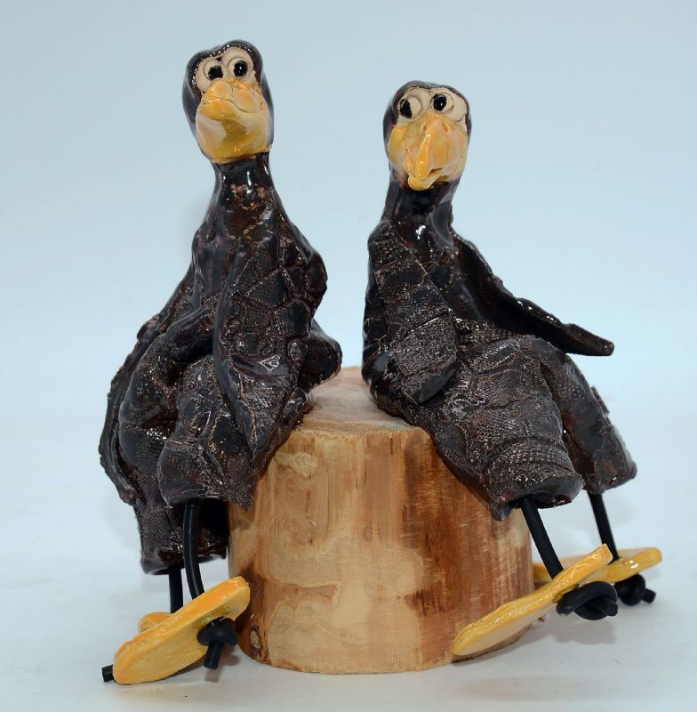 To fugle på træstub