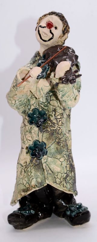 Klovn med instrument