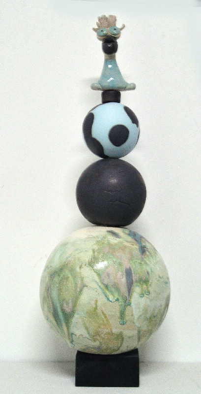 Kugleskulptur med fabeldyr