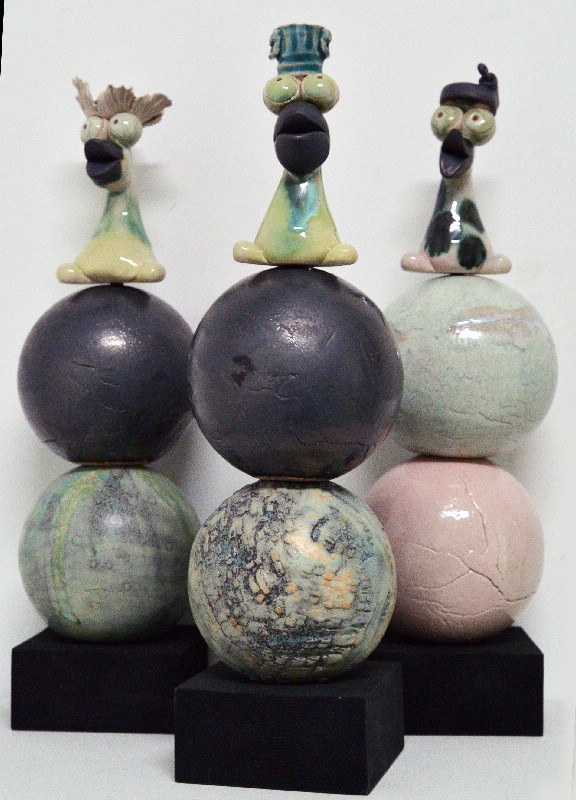 Kugleskulptur med fabeldyr