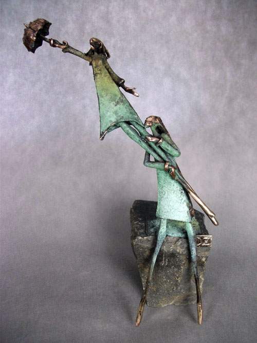 Umbrella Pair On A Wind