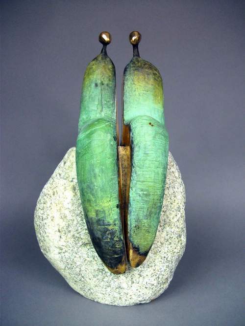 Puzzelz Sitting On A Stone