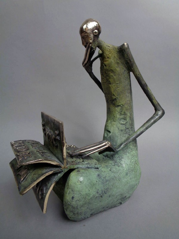 Sitting Man With Notebook