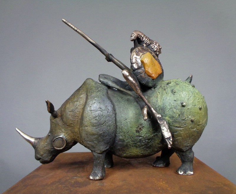 Rhino Rider With a Orange Stone