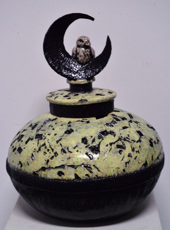 Keramikkrukke med låg og fugl