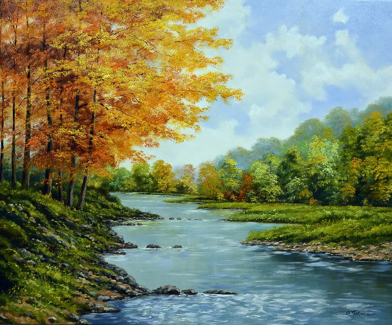 First Autumn Glow By The River