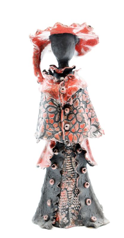 Kvinde med kjole og hat