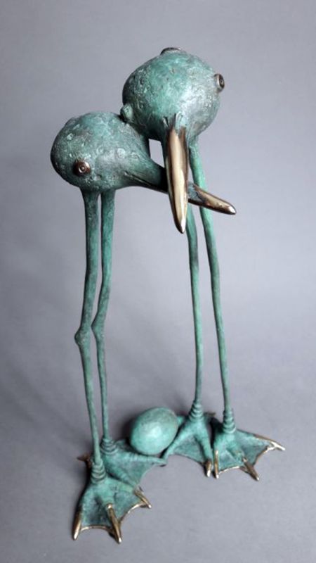 Green Birds With An Egg