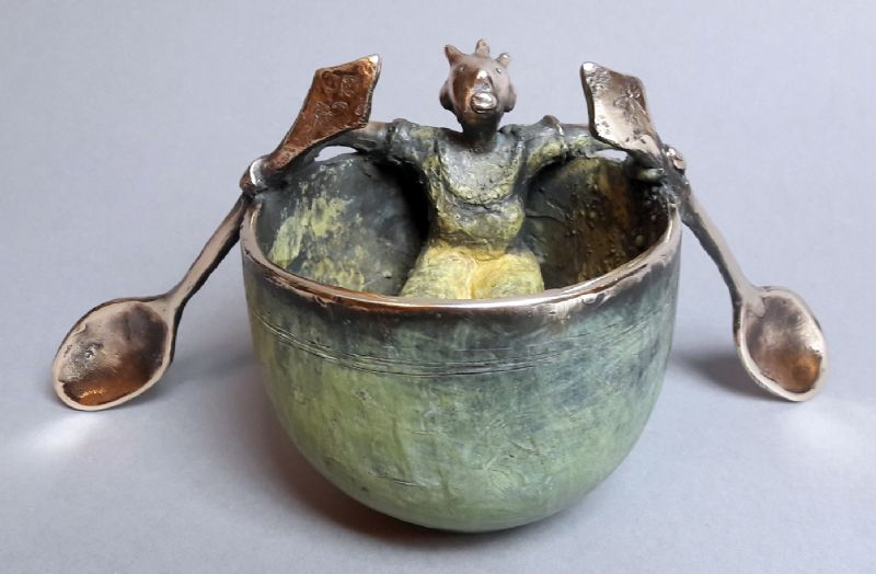 Girl With A Cup With Spoon