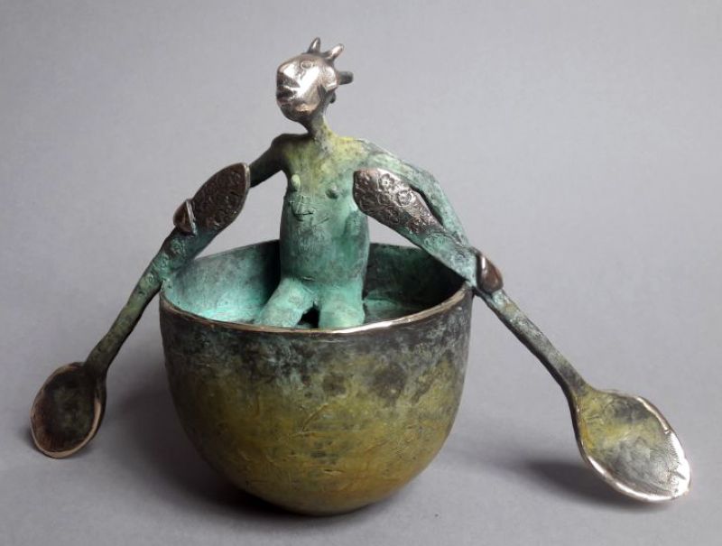 Rowing Girl In A Cup