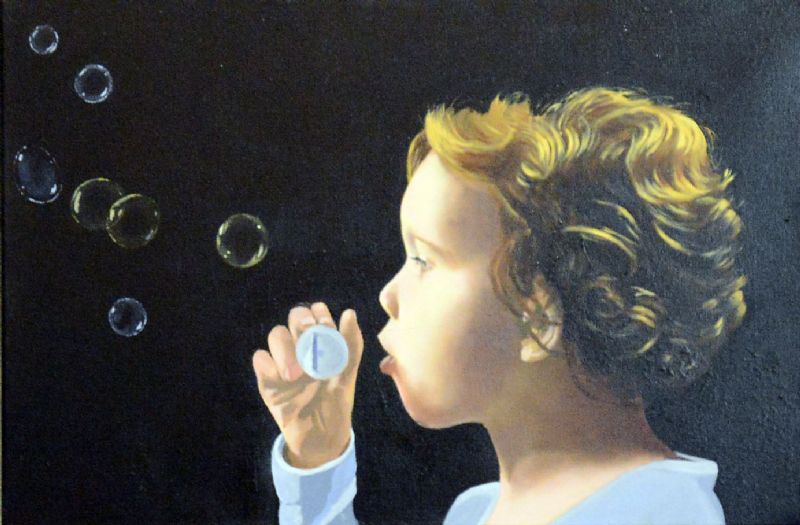 Pigen blæser bobler
