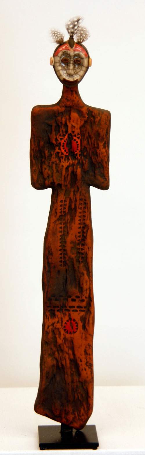 Afrikaner med maske og fjer